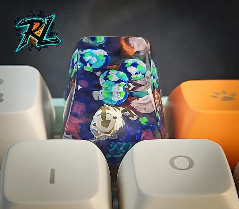 Keycap Mold 3D Print: The Ultimate Step-by-Step Guide 4 Keycap Mold 3D Print: A clear resin artisan keycap featuring a miniature Appa figurine surrounded by blue and green moss elements