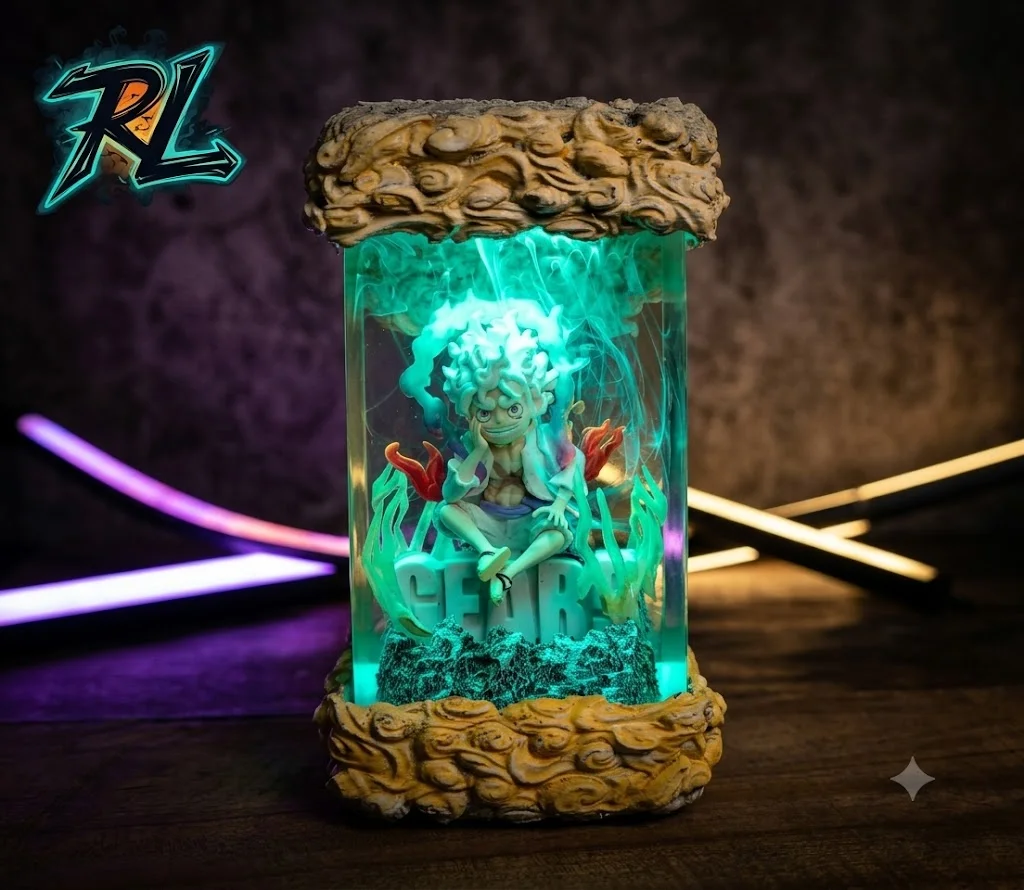 One Piece Lamp Luffy For Anime Fans And Collectors 2 Luffy Gear 5 seated in his Sun God Nika form illuminated by dramatic LED lighting