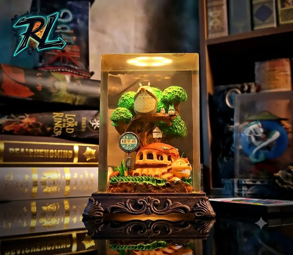 Resins in Plants: Illuminating Your Space with 3D Art 6 An exquisitely handcrafted Totoro diorama resin lamp featuring vibrant green flora glowing warmly under an integrated LED base