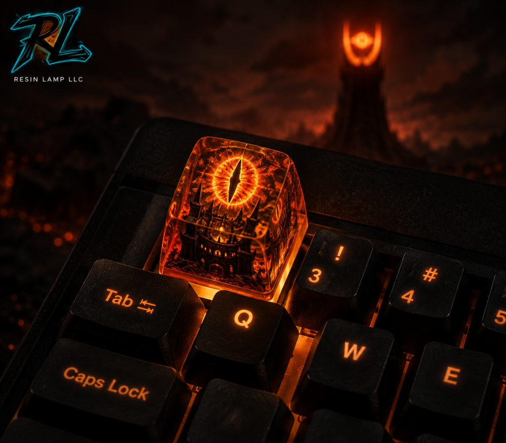 LOTR Keycaps: Bring Middle-earth Magic To Your Keyboard 2 The Eye of Sauron keycap casts an amber glow across a dark keyboard, echoing the watchful gaze of Mordor.